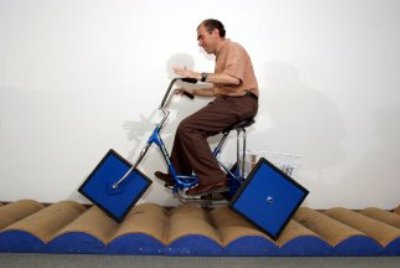Riding a tricycle with square wheels